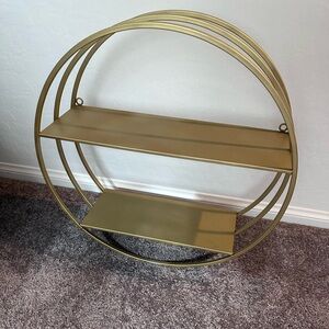 Gold circular shelving